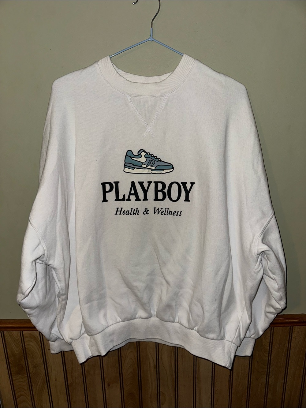 PLAYBOY White Crewneck Sweatshirt with Blue Sneaker Graphic